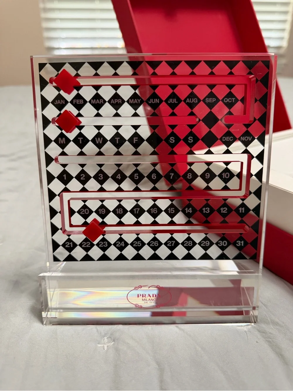 Prada Black & White Acrylic Perpetual Calendar with Red Markers
